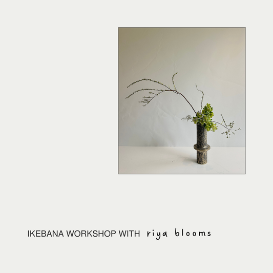 Vase with branches and flowers on a white background, featuring text 'Ikebana Workshop with riya blooms'.