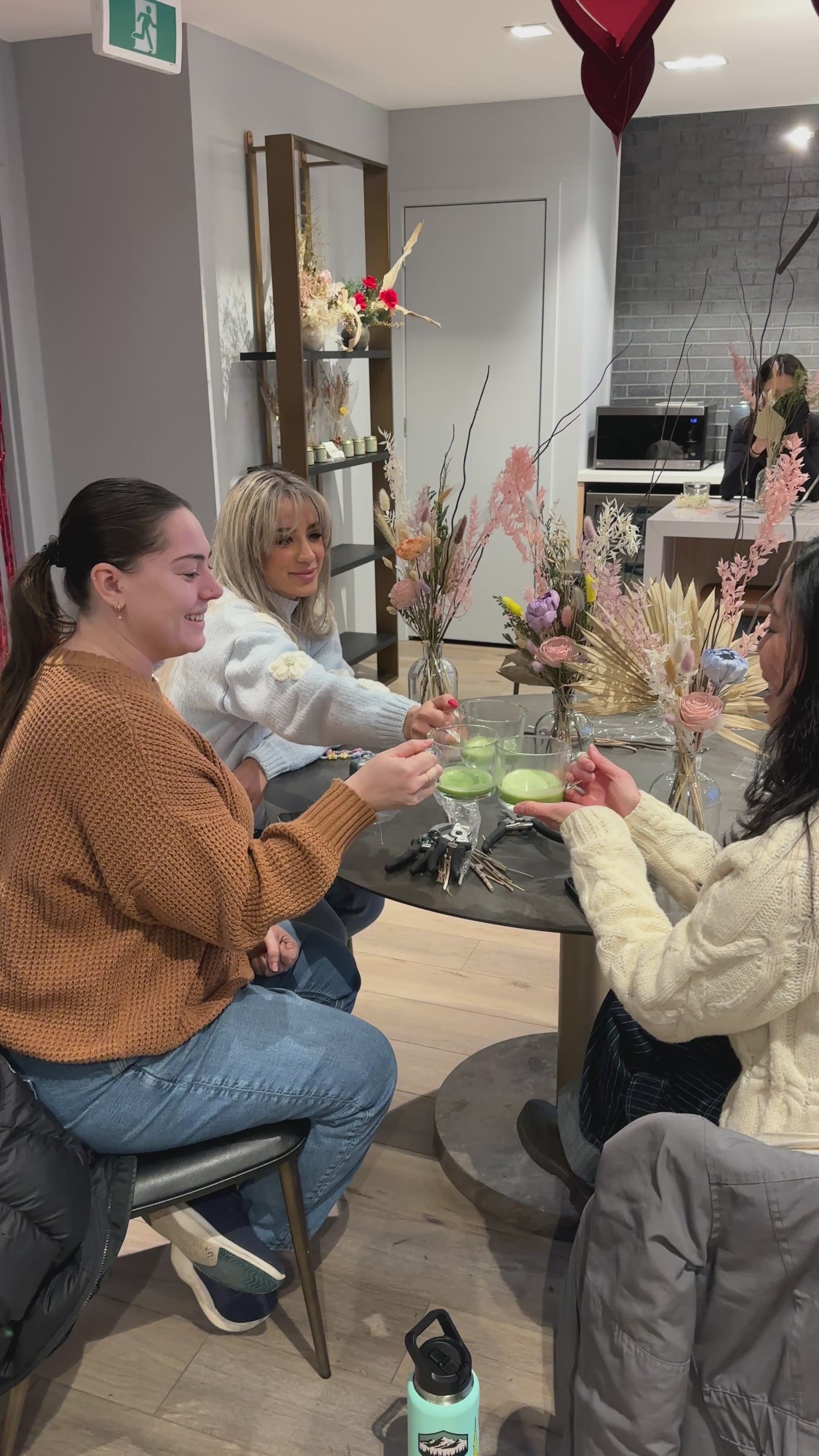 Video of group of girls drinking matcha in a modern room