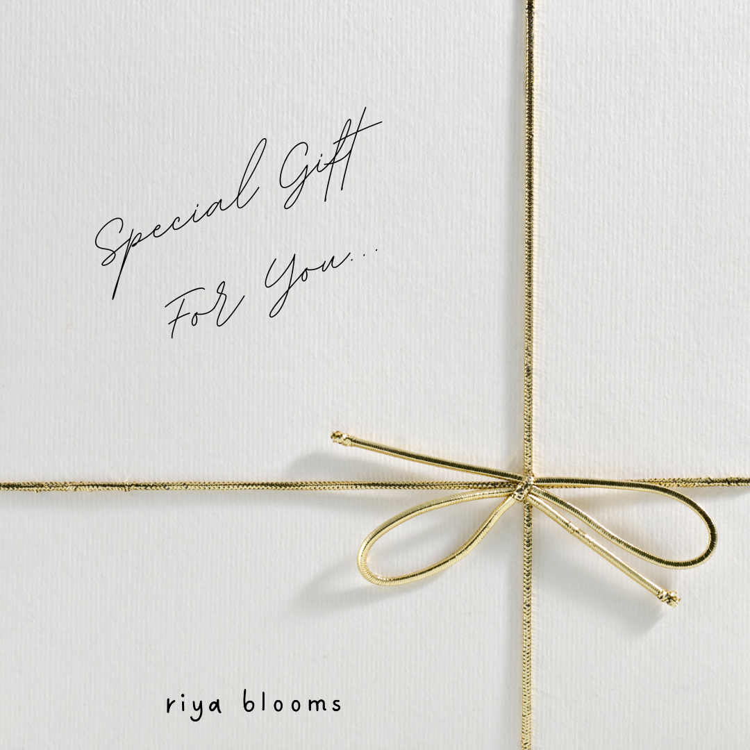 Gift wrapped in gold ribbon with 'Special Gift For You' text on a white background